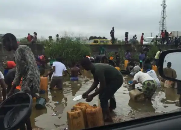 More Photos Of People Scooping Fuel From Fallen Tanker In Ibafo, Ogun